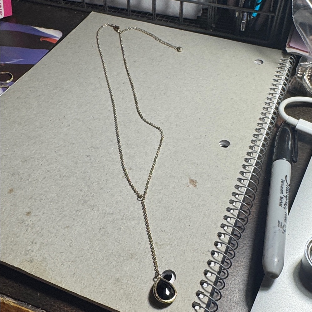 Chic Gold Tone Necklace with Black Accent